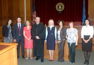 U.S. District Judge Stephen P. Friot (fourth from left) and administrators and faculty from Russia’s Lobachevsky State University Faculty of Law visit the Bell Court Room of the University of Oklahoma College of Law.  Judge Friot hosted the delegation for Open World.